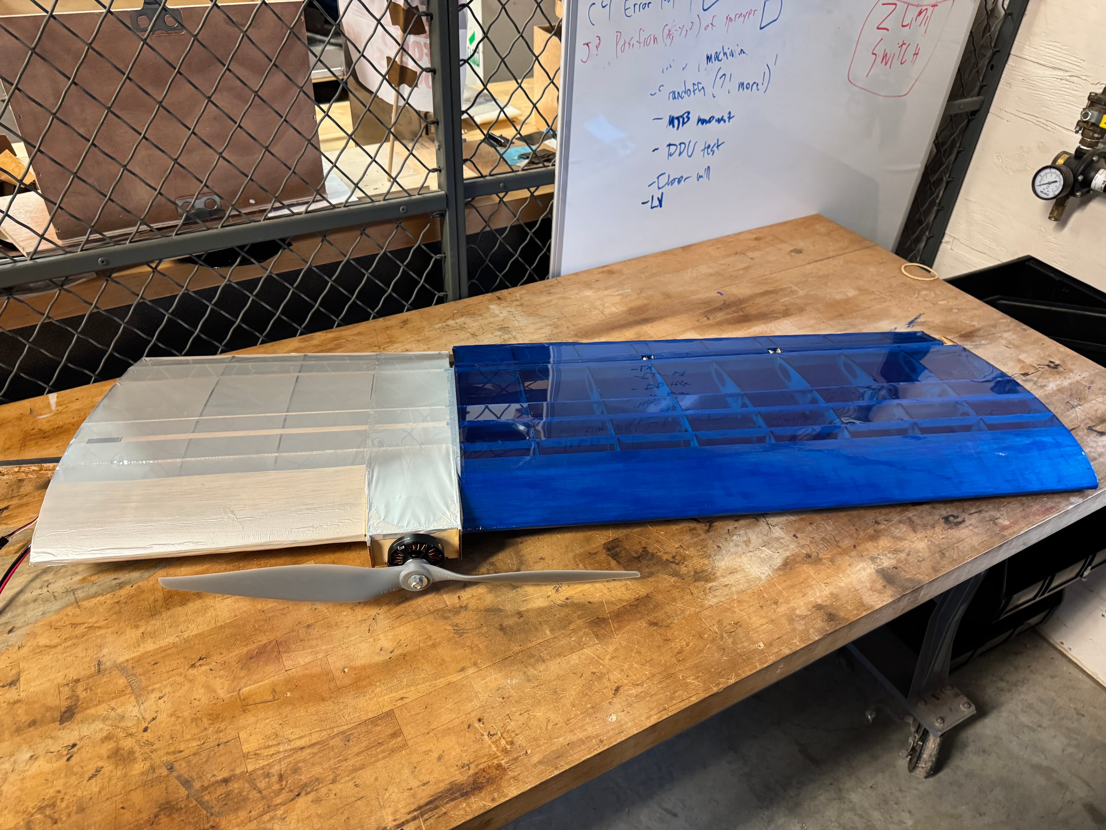 Completed SUAS wing and fuselage on the assembly table